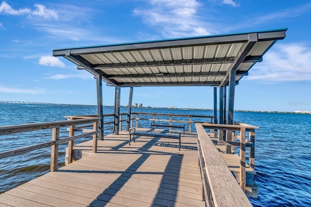 dock area with a water view