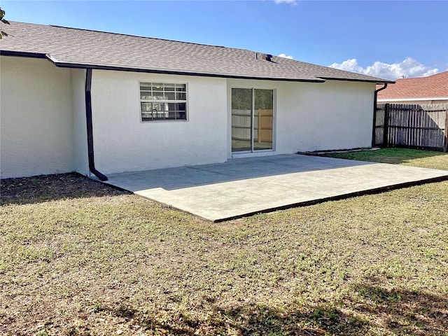 back of property with a patio area