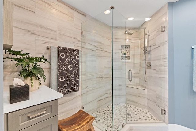 bathroom featuring an enclosed shower