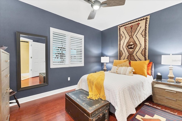 bedroom featuring ceiling fan and dark hardwood / wood-style floors