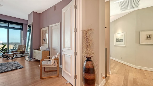 hallway featuring light hardwood / wood-style floors