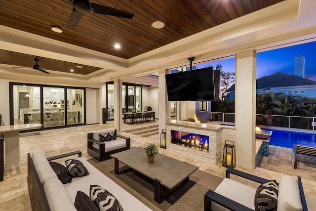 view of patio with a fenced in pool, outdoor lounge area, and ceiling fan