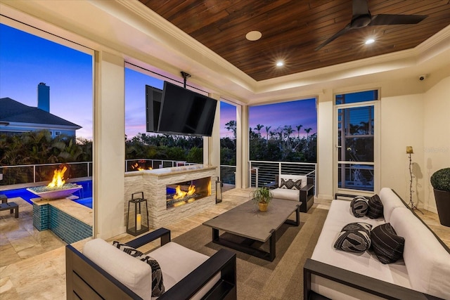 view of patio featuring an outdoor living space and ceiling fan