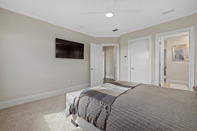 bedroom featuring light carpet and ceiling fan