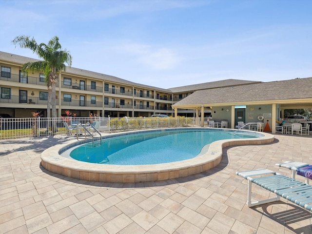 view of swimming pool featuring a patio