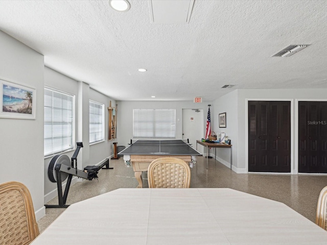 game room with recessed lighting, visible vents, a textured ceiling, and baseboards