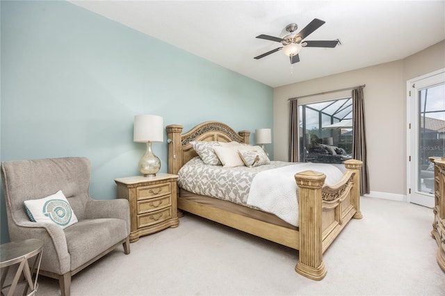 carpeted bedroom with ceiling fan and access to outside