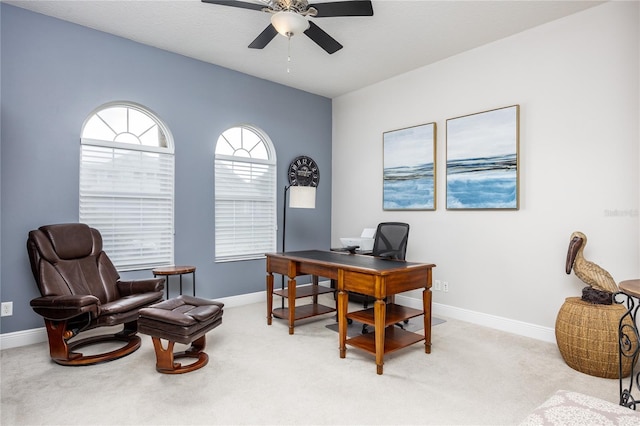 office area with ceiling fan and light colored carpet