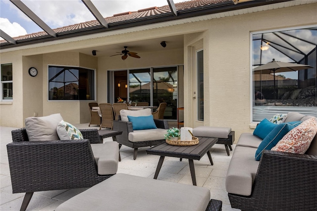 view of patio / terrace featuring outdoor lounge area and ceiling fan