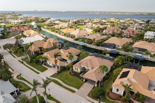 bird's eye view with a water view