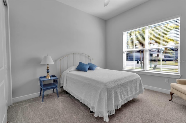 bedroom with carpet and ceiling fan