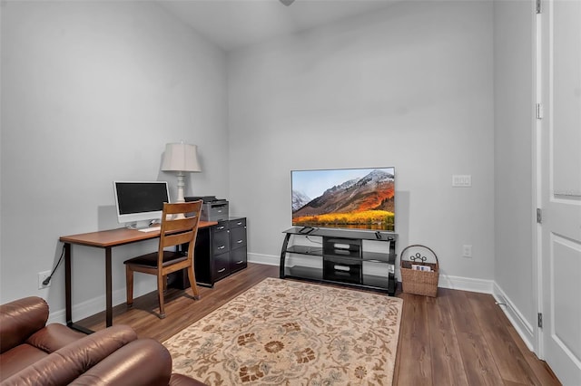 office space with hardwood / wood-style flooring