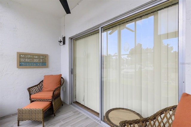 balcony featuring ceiling fan