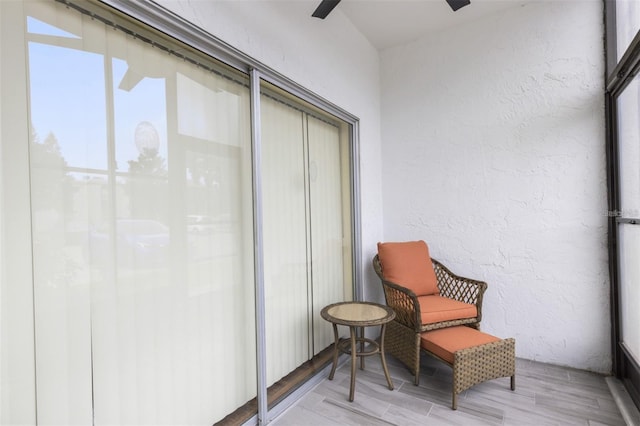 balcony featuring ceiling fan