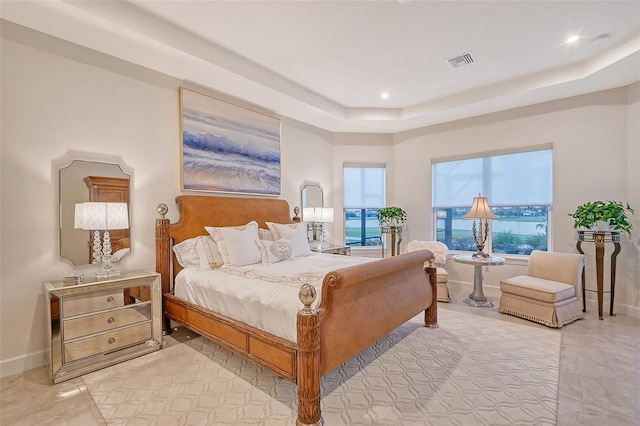 bedroom featuring a tray ceiling