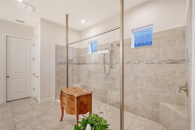 bathroom featuring tiled shower