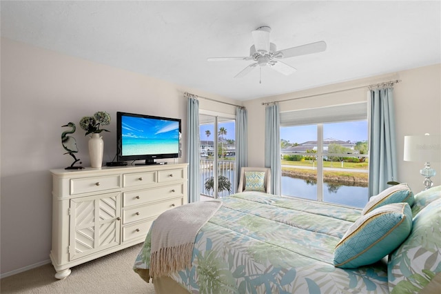 bedroom featuring light colored carpet and ceiling fan