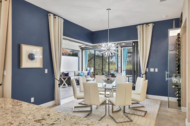 dining area with a notable chandelier