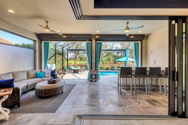 view of patio featuring ceiling fan