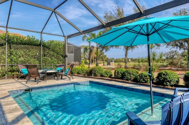 view of pool featuring a lanai and a patio area