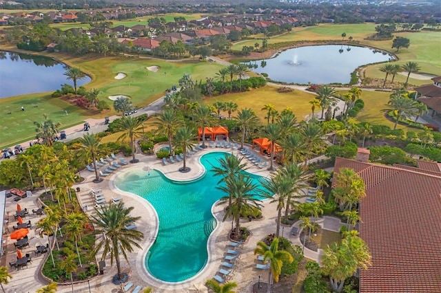 view of pool with a water view