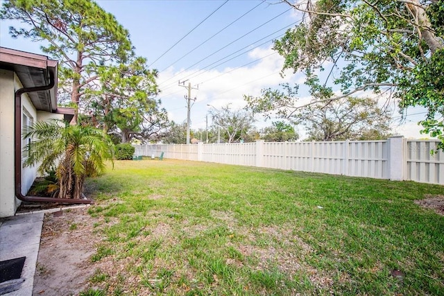 view of yard featuring a fenced backyard