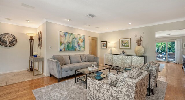 living room with light hardwood / wood-style floors