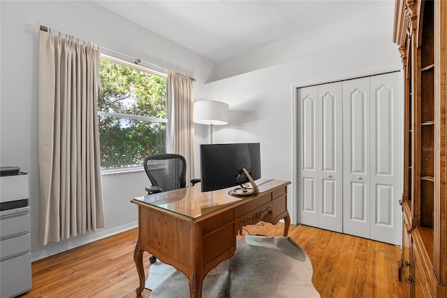 office area with light hardwood / wood-style flooring