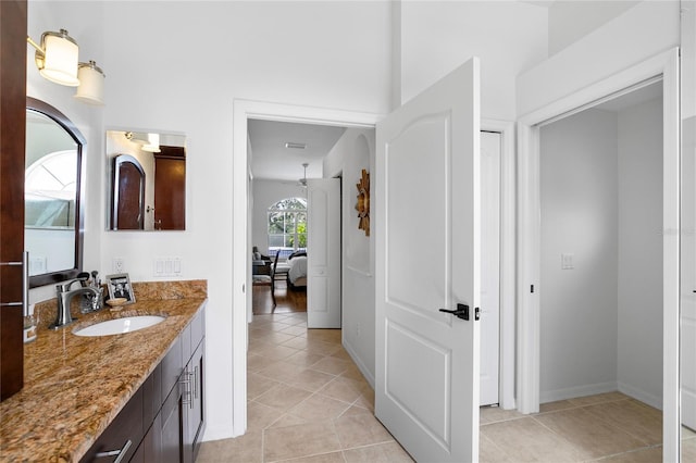 bathroom featuring vanity and tile patterned flooring