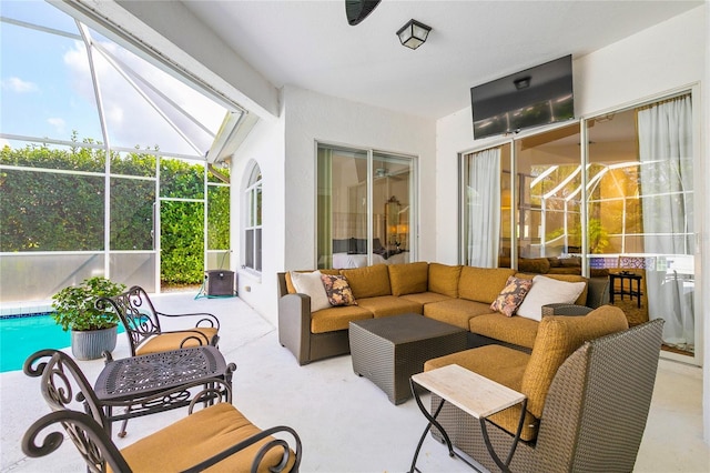 view of patio / terrace with an outdoor living space and glass enclosure