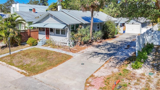 bungalow-style home with a garage