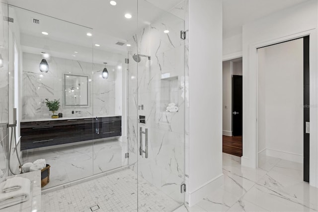 bathroom with a shower with door