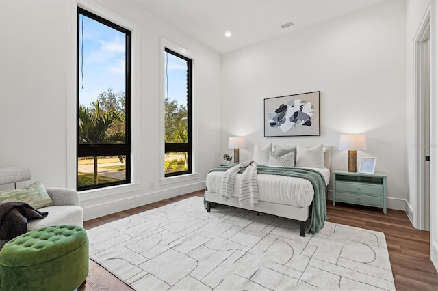 bedroom featuring hardwood / wood-style floors