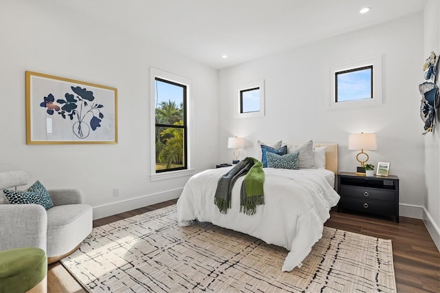 bedroom with wood-type flooring