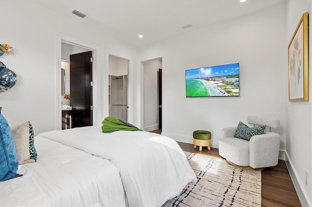 bedroom with wood-type flooring