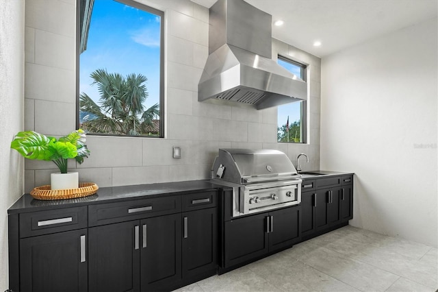 view of patio featuring sink, grilling area, and an outdoor kitchen