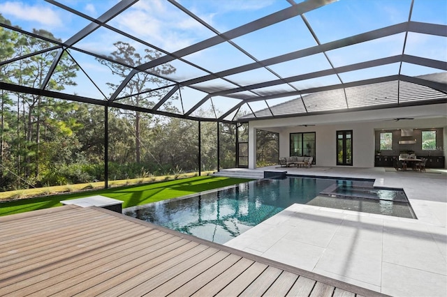 view of pool featuring ceiling fan, an outdoor living space, a lanai, and a patio