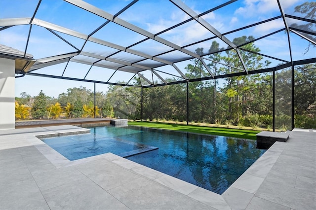 view of swimming pool featuring a patio and glass enclosure