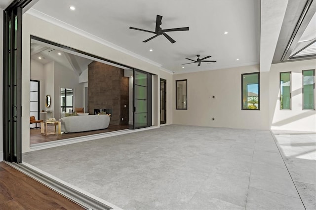 view of patio featuring ceiling fan