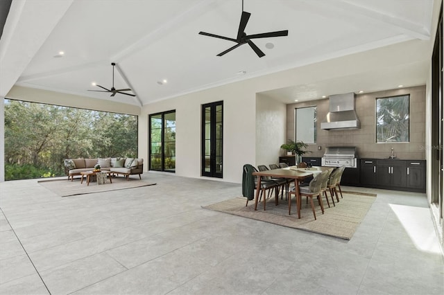 view of patio / terrace with an outdoor kitchen, ceiling fan, outdoor lounge area, and sink