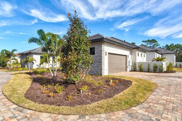 view of front of home with a garage