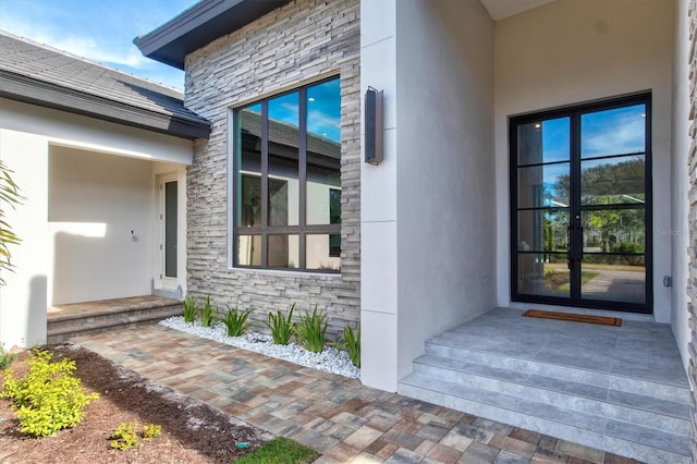 view of exterior entry with french doors