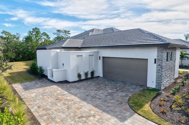 view of side of property with a garage