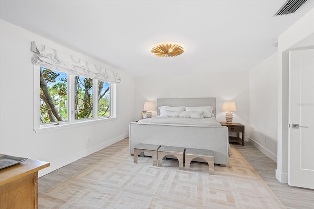 bedroom featuring light hardwood / wood-style flooring