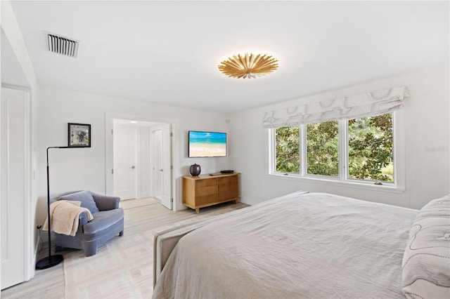 bedroom featuring light hardwood / wood-style floors