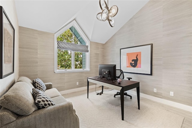 office area with high vaulted ceiling and a chandelier