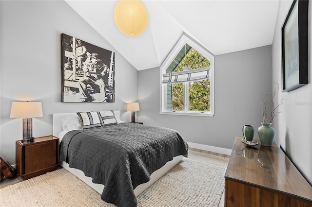 bedroom featuring vaulted ceiling