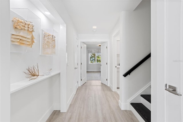 hall with light wood-type flooring