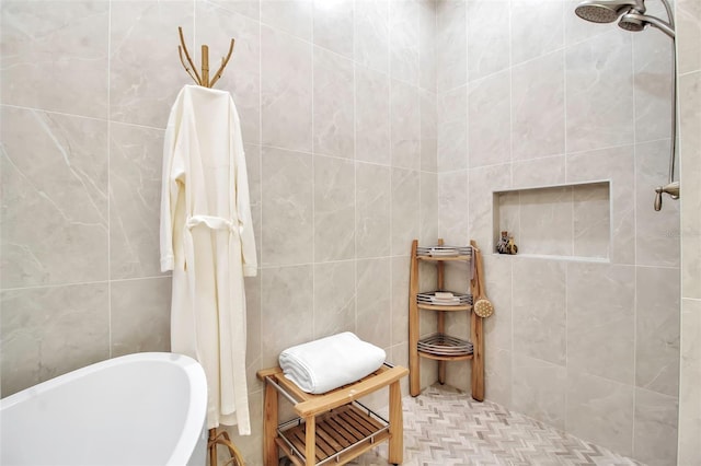 bathroom featuring independent shower and bath and tile walls