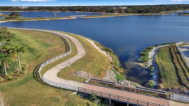 birds eye view of property featuring a water view